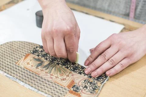 Handmade tailoring fabric cutting process Stock Photos