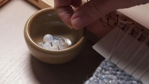 Handmade tapestry in slow motion Video stock 167931696