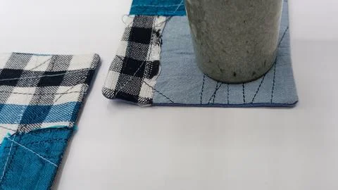 Handmade textile squares modern patchwork design. 库存照片