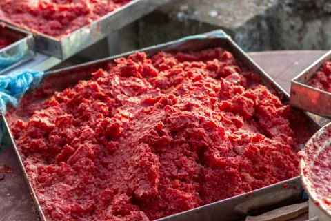 Handmade tomato paste making process of angled shot under afternoon sun Stock Photos