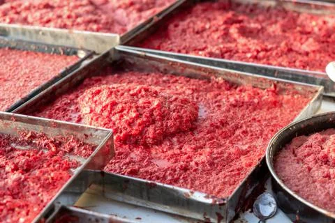 Handmade tomato paste making process of angled shot under afternoon sun Stock-Fotos