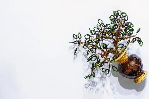 Handmade tree made of black and green beads Stock Photos