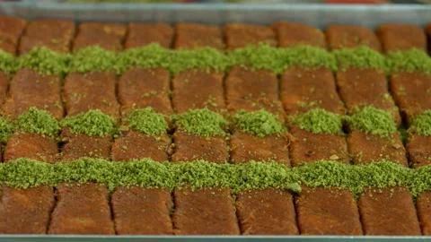 Handmade turkish dessert baklava ..walnut, pistachio antep baklava presentation Stock-Footage 232360341