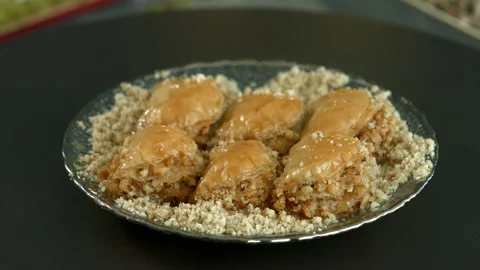 Handmade turkish dessert baklava ..walnut, pistachio antep baklava presentation Stock Footage 232906868
