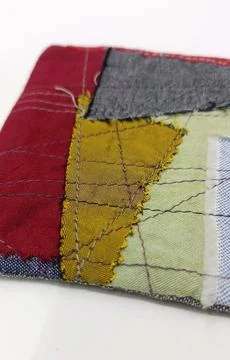 Handmade upcycled patchwork fabric coaster Stock Photos