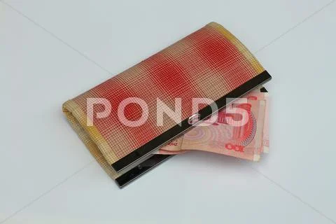 Handmade wallet and Chinese yuan on white background Stock Photos