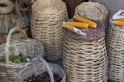 Handmade wicker baskets made from corn cobs and chestnuts Stock Photos