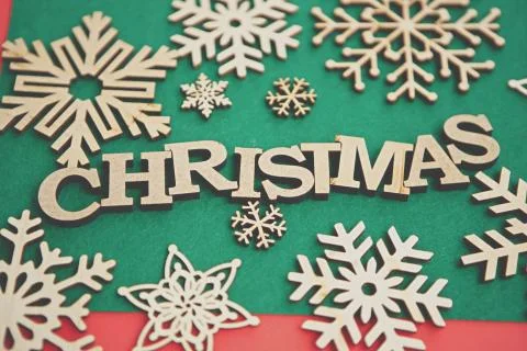 Handmade winter holiday background with rustic wooden elements in flat lay Stock Photos