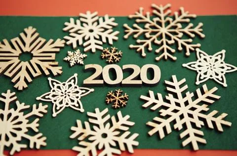 Handmade winter holiday background with rustic wooden elements in flat lay Stock Photos