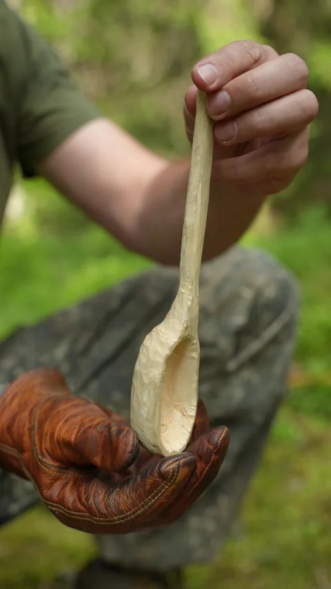 Handmade wooden spoon Stock Footage 340653956