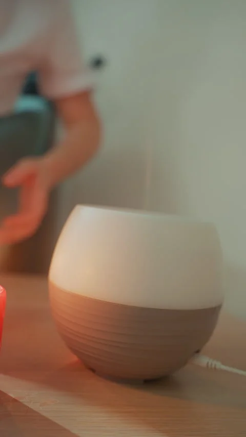 Handoperated diffuser light creating relaxing evening ambiance. Elegant Stock Footage 328151627