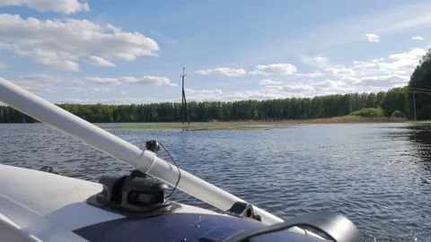 Handpainted Old Wooden Oar Pull Lake Water and Make Splashes. HD Slowmotion Stock Footage 76248790
