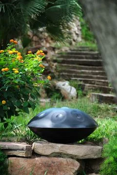 Handpan or hang in the garden Stock Photos