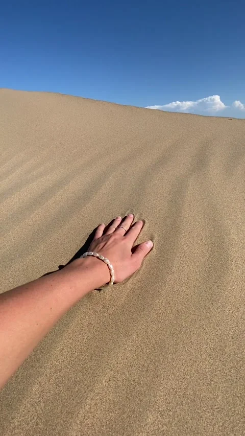 Handprint on the dune Stock Footage 251663715