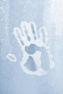 Handprint on ice Stock-Fotos