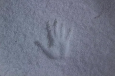A Handprint in the snow Stock Photos