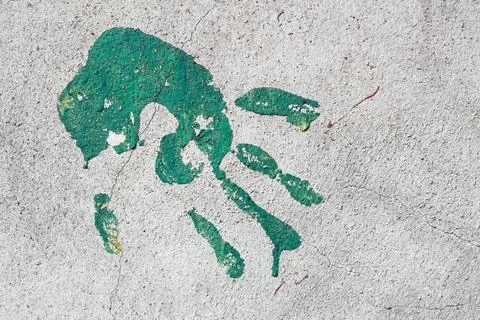 Handprint on white wall Foto stock