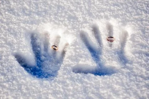 Handprints on the snow Stock Photos