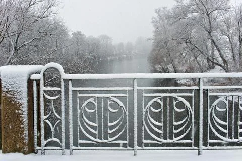 Handrail of a bridge in the winter. Stock Photos
