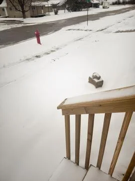 A handrailing covered in snow Stock Photos