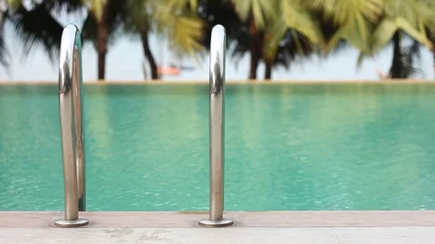 Handrails at border of swimming pool. Stock Footage 81317177