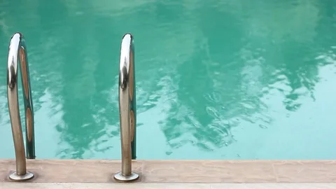 Handrails at border of swimming pool. Stock Footage 81400877