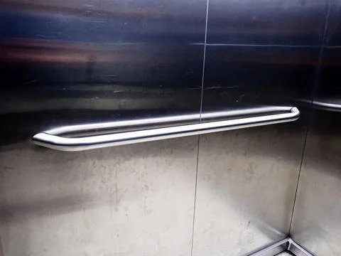 Handrails in elevators Stock Photos