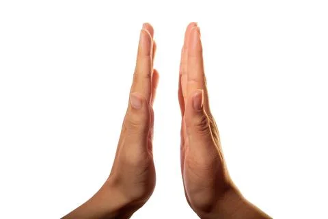 Hands about to collide isolated on white background. Friendship greeting. Stock Photos