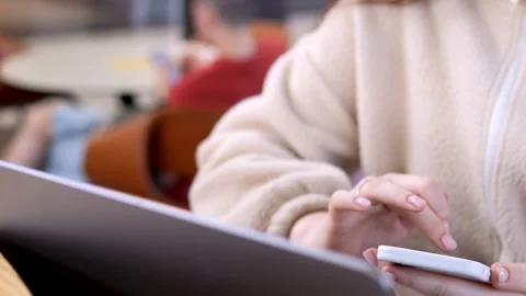 Hands actively using a smartphone Stock Footage 341479647
