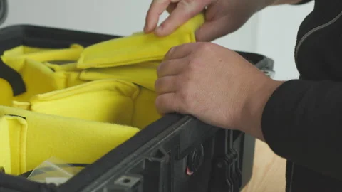 Hands Adjusting Padded Camera Case Dividers with Velcro - Sound Included Stock-Footage 318749197