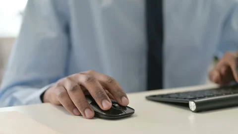 Hands of African Man Using Mouse and Keyboard, Close Up Stock Footage 146484618