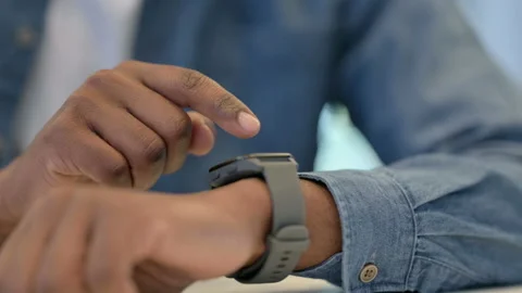 Hands of African Man Using Smartwatch, Close Up Stock Footage 146484426