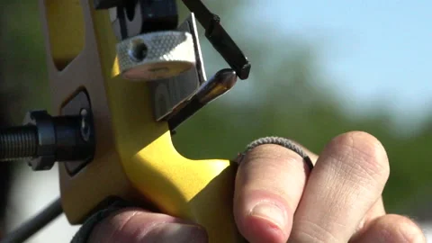 Hands and bow during olympic archery target practice, close up slow motion Stock Footage 148646111