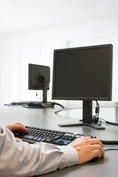 Hands and computer Stock Photos