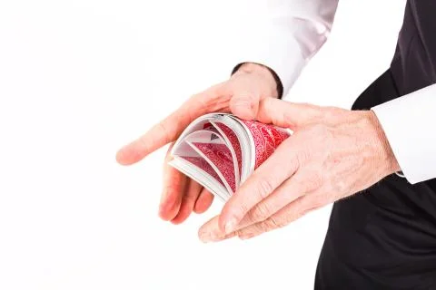 Hands and a deck of cards Stock Photos