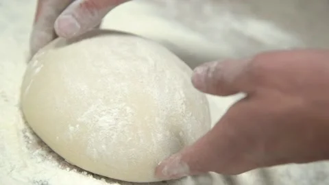 Hands and dough. Stock Footage 131520687