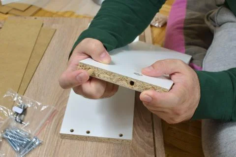 Hands and Dowels Stock Photos