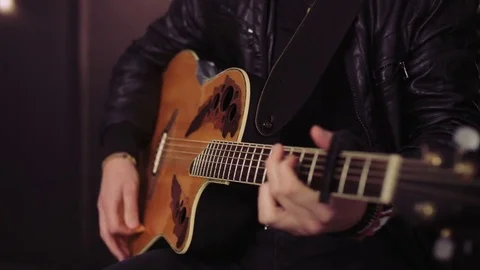 Hands and Face of a Bearded Man Playing Guitar Stock Footage 75092372