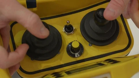 Hands and industrial wireless remote control panel, industry Stock Footage 108399328