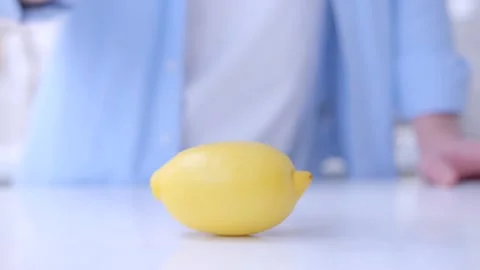 Hands and lemon Stock Footage 134232143