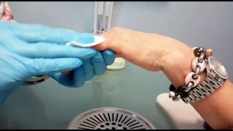 Hands and nails care polish treatment pulizia unghie e smalto Stock Footage 101283313