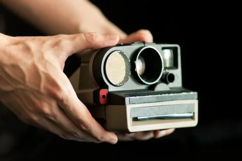 Hands and old camera 스톡 사진