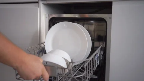 Hands and plates in dishwasher Stock Footage 110905483