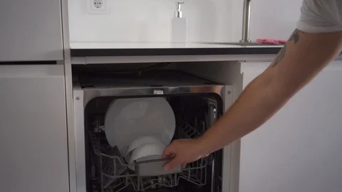 Hands and plates in dishwasher Stock Footage 110905484