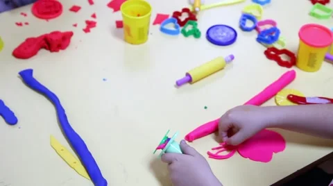 Hands and play dough Stock Footage 68177516