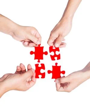 Hands and puzzle Stock Photos