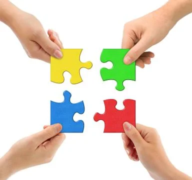 Hands and puzzle Stock Photos