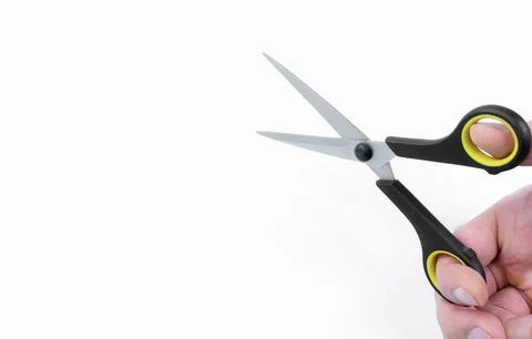 Hands and scissors on a white background Stock Photos