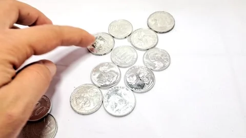 Hands and Silver Coins. Stock Footage 329908216