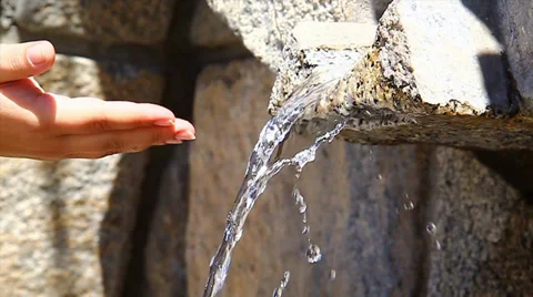 The hands and the source Stock Footage 34397364